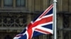 U.K. – The flag of Great Britain and the flag of Ukraine fly in front of the Houses of Parliament on Ukraine Independence Day in London, August 24, 2022