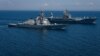 AT SEA -- The U.S. Navy Arleigh Burke-class guided-missile destroyer USS Porter and the Blue Ridge-class command and control ship USS Mount Whitney sail in formation during the U.S.-Ukraine multinational maritime exercise Sea Breeze 2018 in the Black Sea 